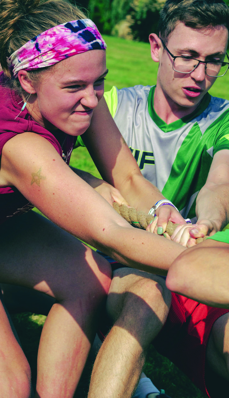 Students play tug-of-war in the Orientation Board Olympics.