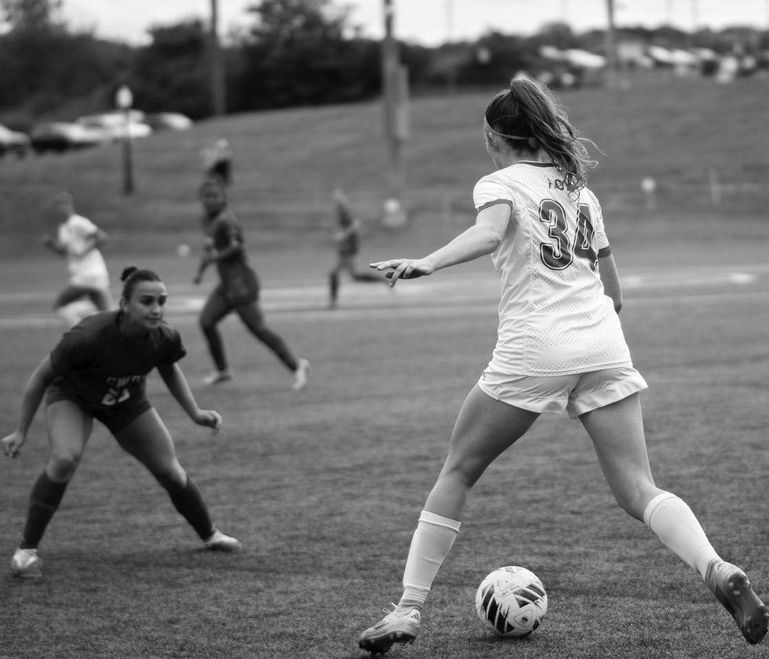 Senior Annie Vannoy takes on a CWRU defender.