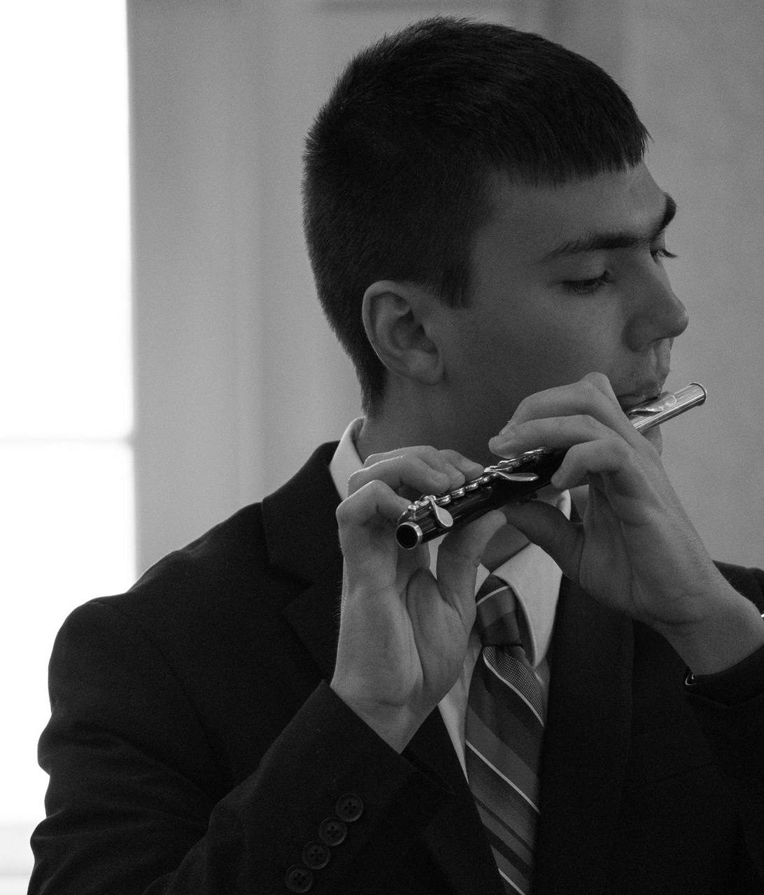 Student plays the piccolo at the Carnegie Christmas Concert.