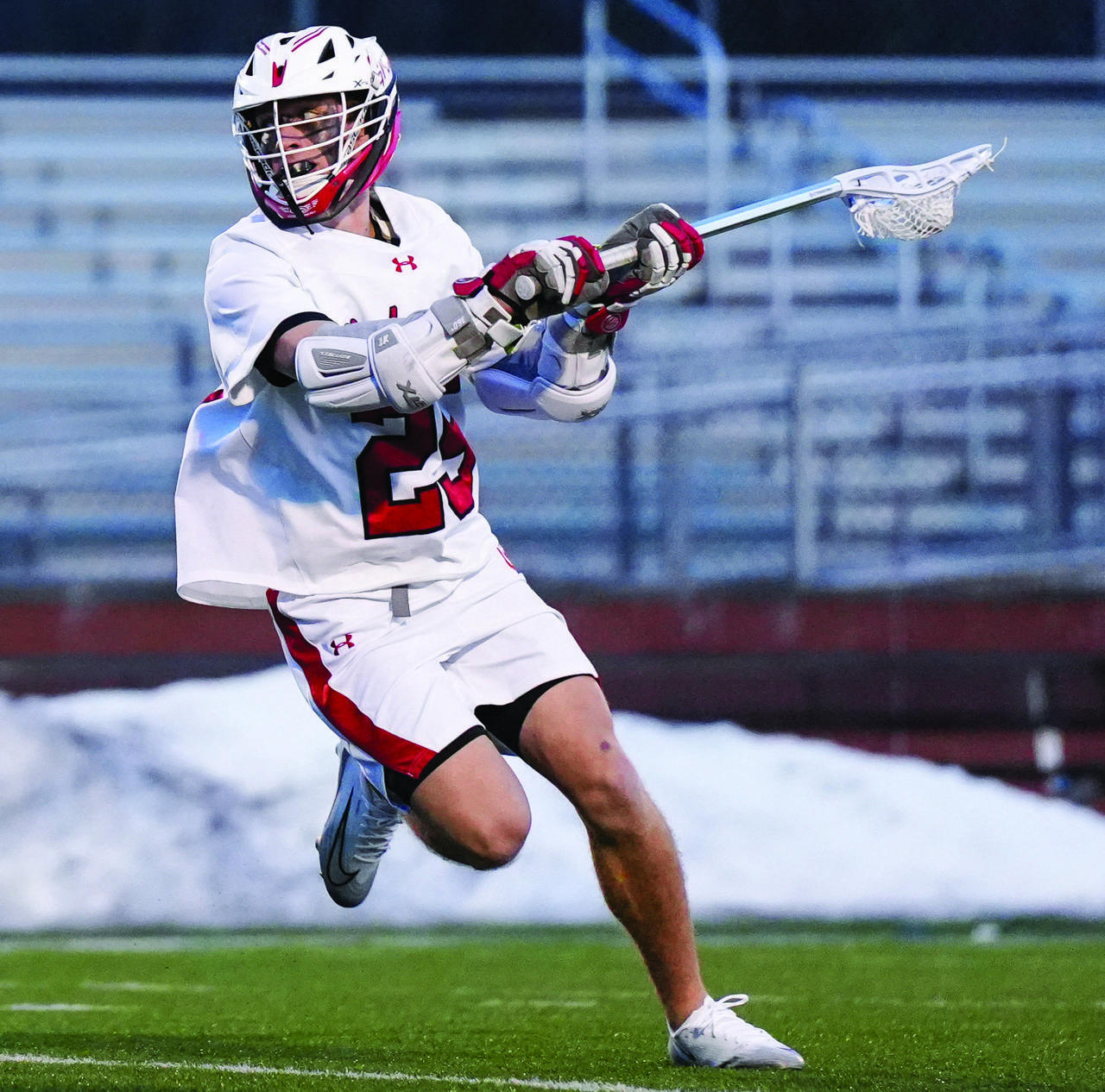 This is a caption for this photo. Senior attack Davis Schneider prepares to shoot versus Franciscan on Tuesday.