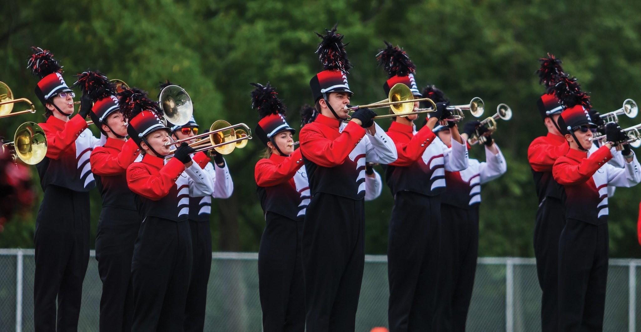The Wolverine Marching Band performs its pregame show Saturday.