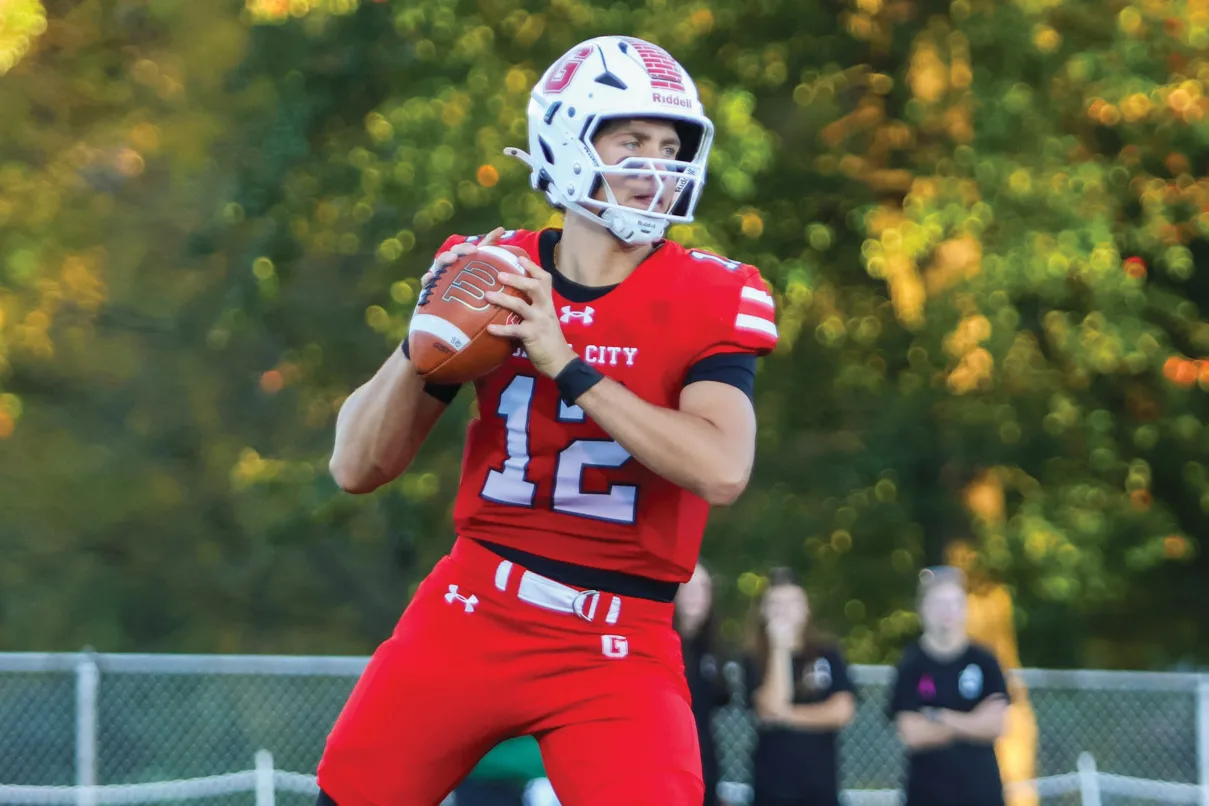 Football scores 5 TDs in conference opener